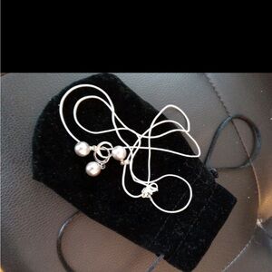 Elegant Silver Necklace with Pearl Accents